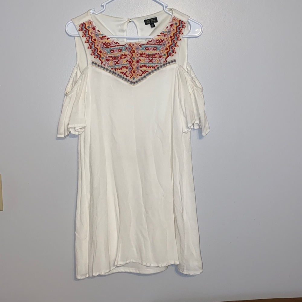 White mini skirt dress with off the shoulder shoulders